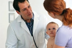 Doctor talking to mother