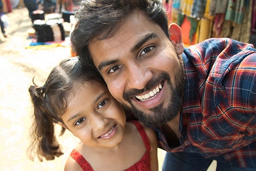 Father taking selfie with daughter