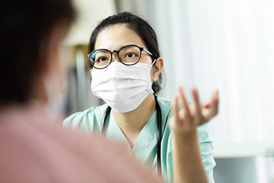 Nurse talking to patient