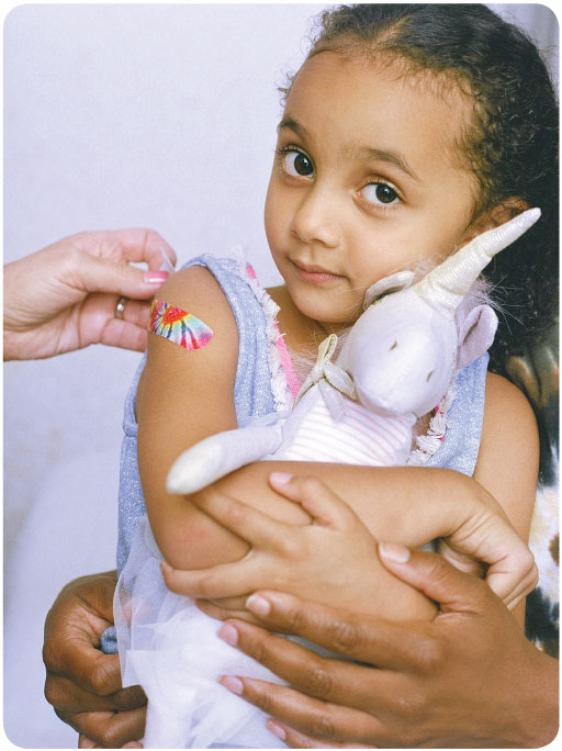 Girl holding a stuffed animal