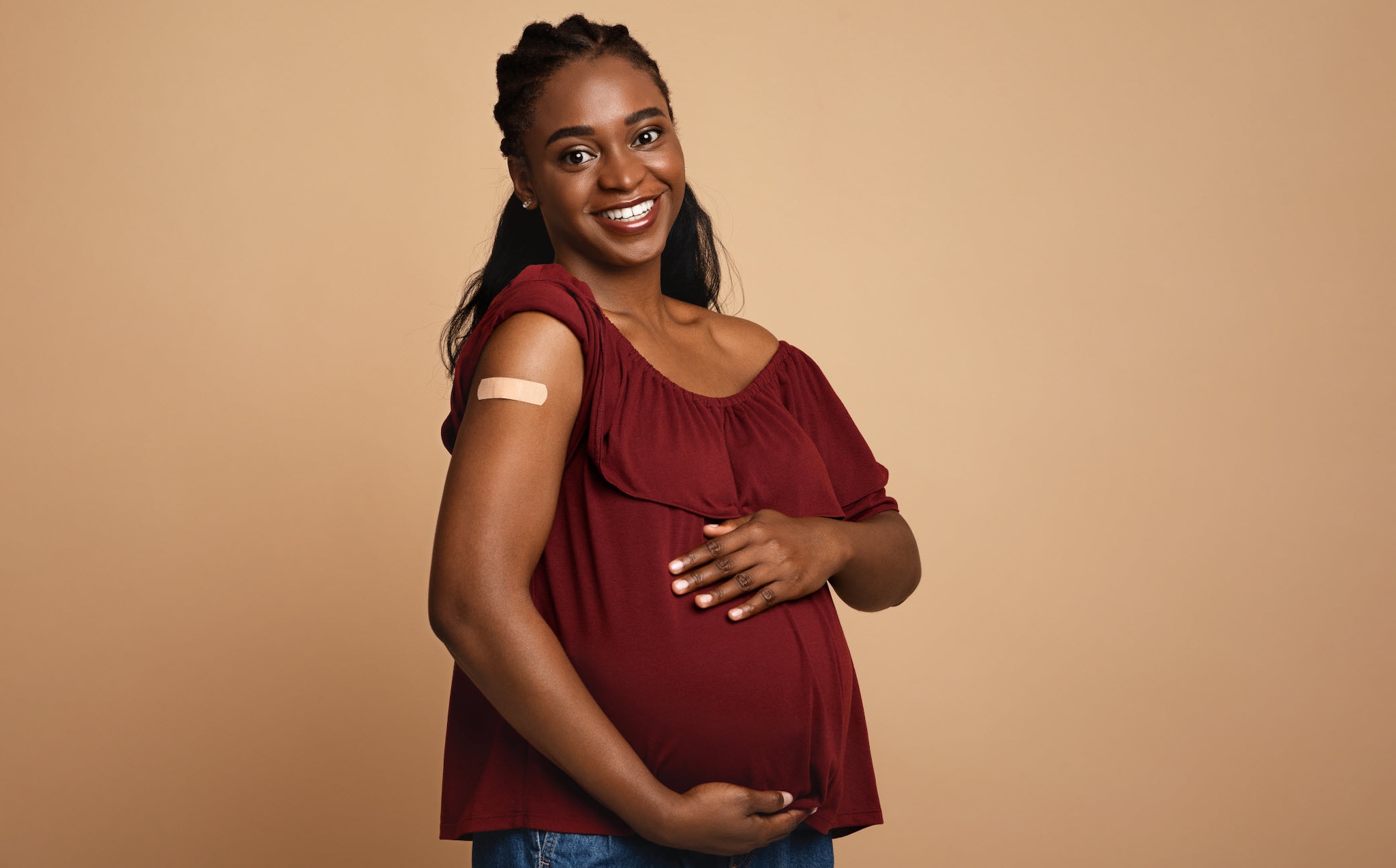 cheerful black woman that got vaccinated against RSV