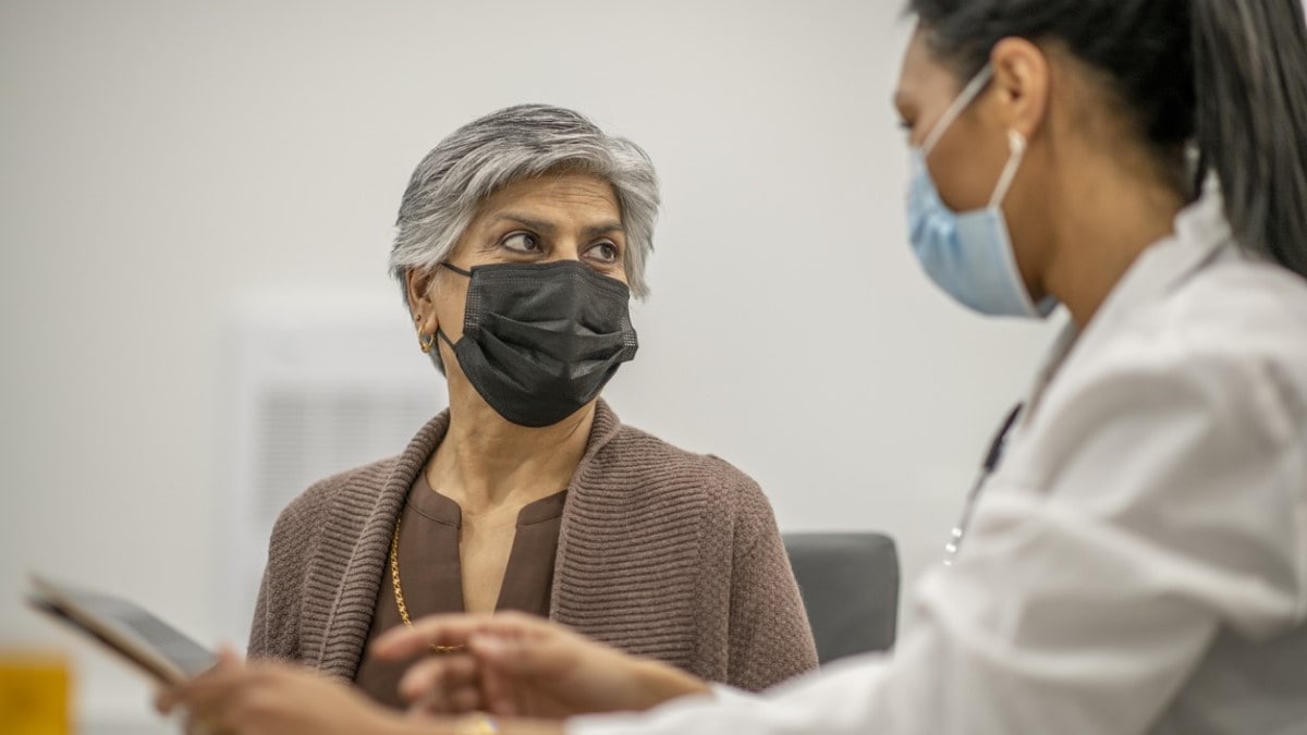 Photo of a woman talking to her doctor