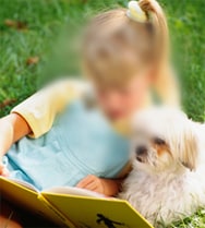 A picture of a girl and her dog, but the center of the picture is blurry.