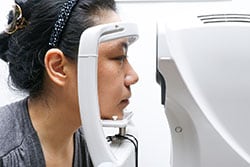 woman getting eye exam