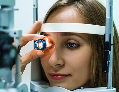 close up of woman getting eye exam