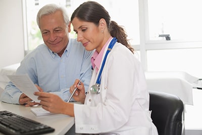 Doctor and patient looking at something