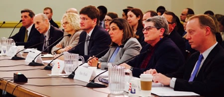 people giving testimony before a congressional hearing