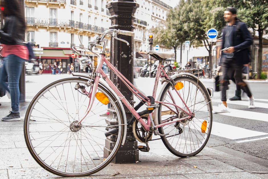 Example image: pink bicycle in city