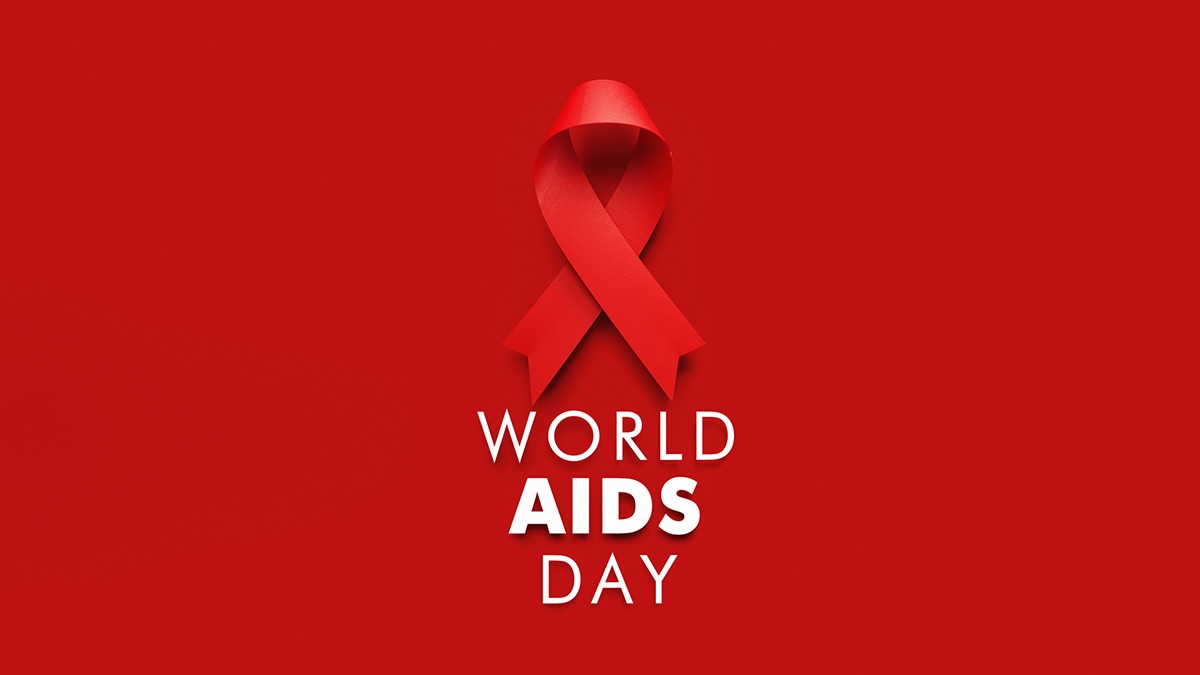 World AIDS Day. Red ribbon on red background.