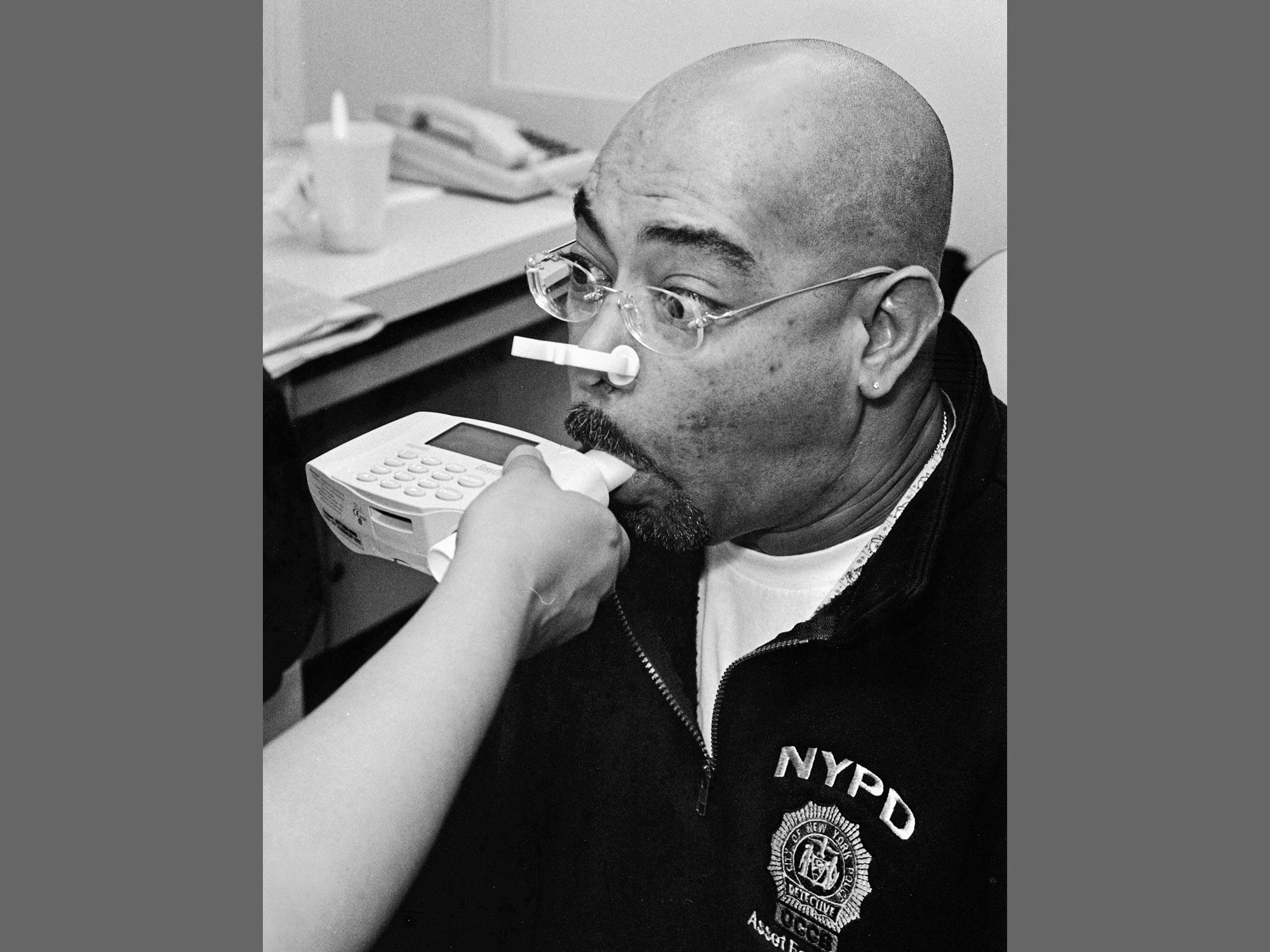 A man undergoing a lung function test at Mount Sinai.