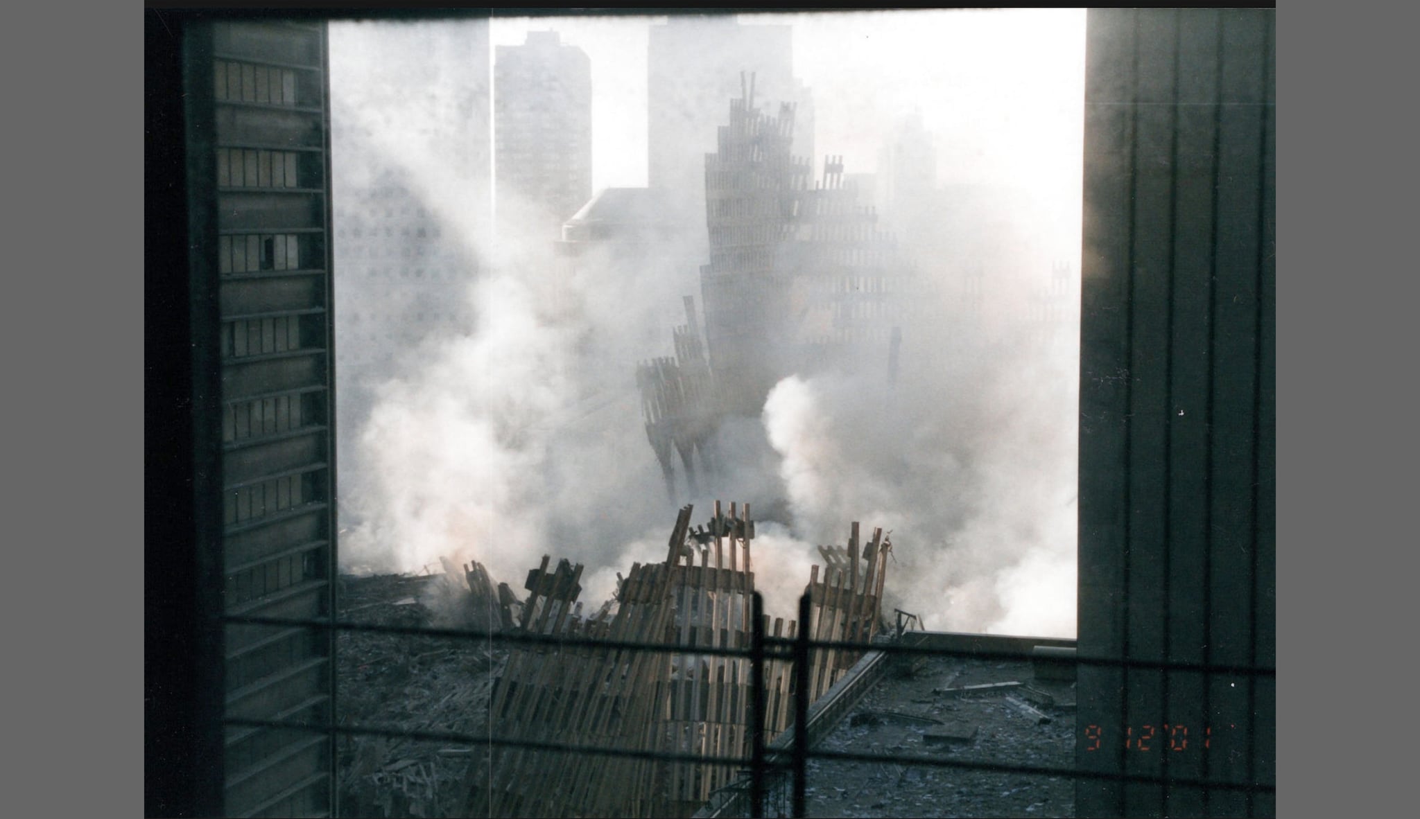 Photo of the fallen World Trade Center towers from a window on September 12, 2001. 