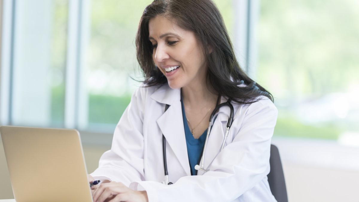 Nurse laptop a doctor using a laptop