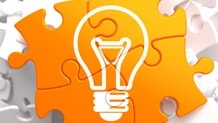 Graphic of lightbulb over a puzzle